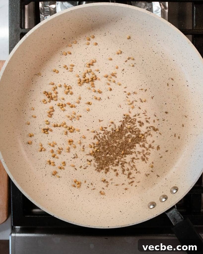 Creamy Vegan Pumpkin Curry with Crispy Tofu 13 toasted cumin and coriander seeds