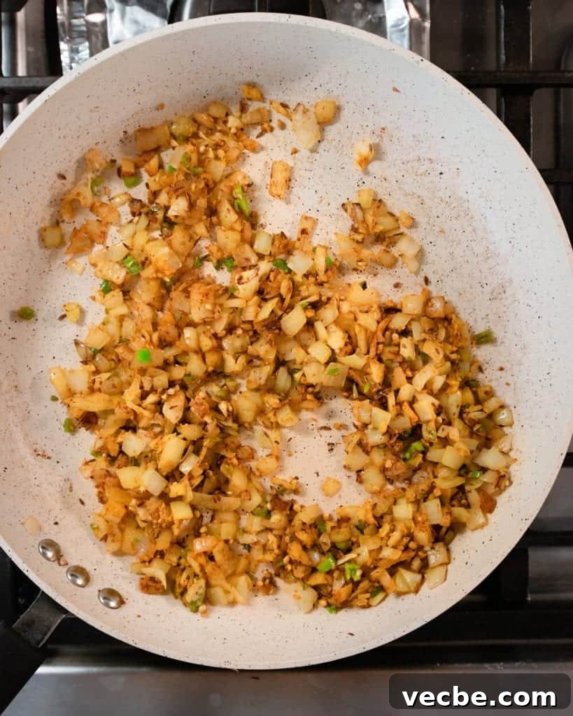 Creamy Vegan Pumpkin Curry with Crispy Tofu 16 spices stirred into aromatics