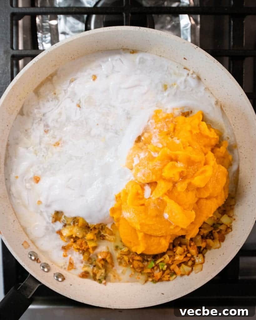 Creamy Vegan Pumpkin Curry with Crispy Tofu 17 pumpkin sauce and coconut milk added to curry