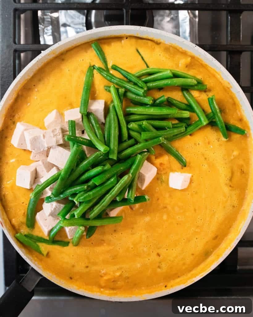 Creamy Vegan Pumpkin Curry with Crispy Tofu 19 green beans added to pumpkin curry