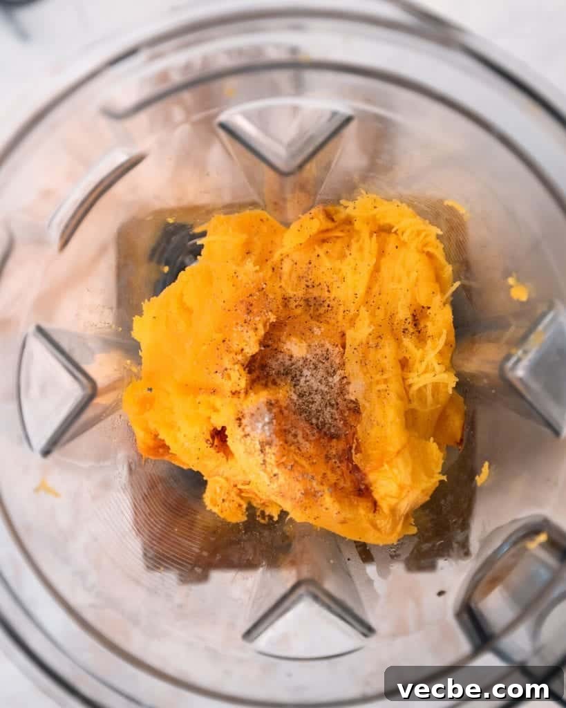 Creamy Vegan Pumpkin Curry with Crispy Tofu 8 roasted pumpkin in a blender