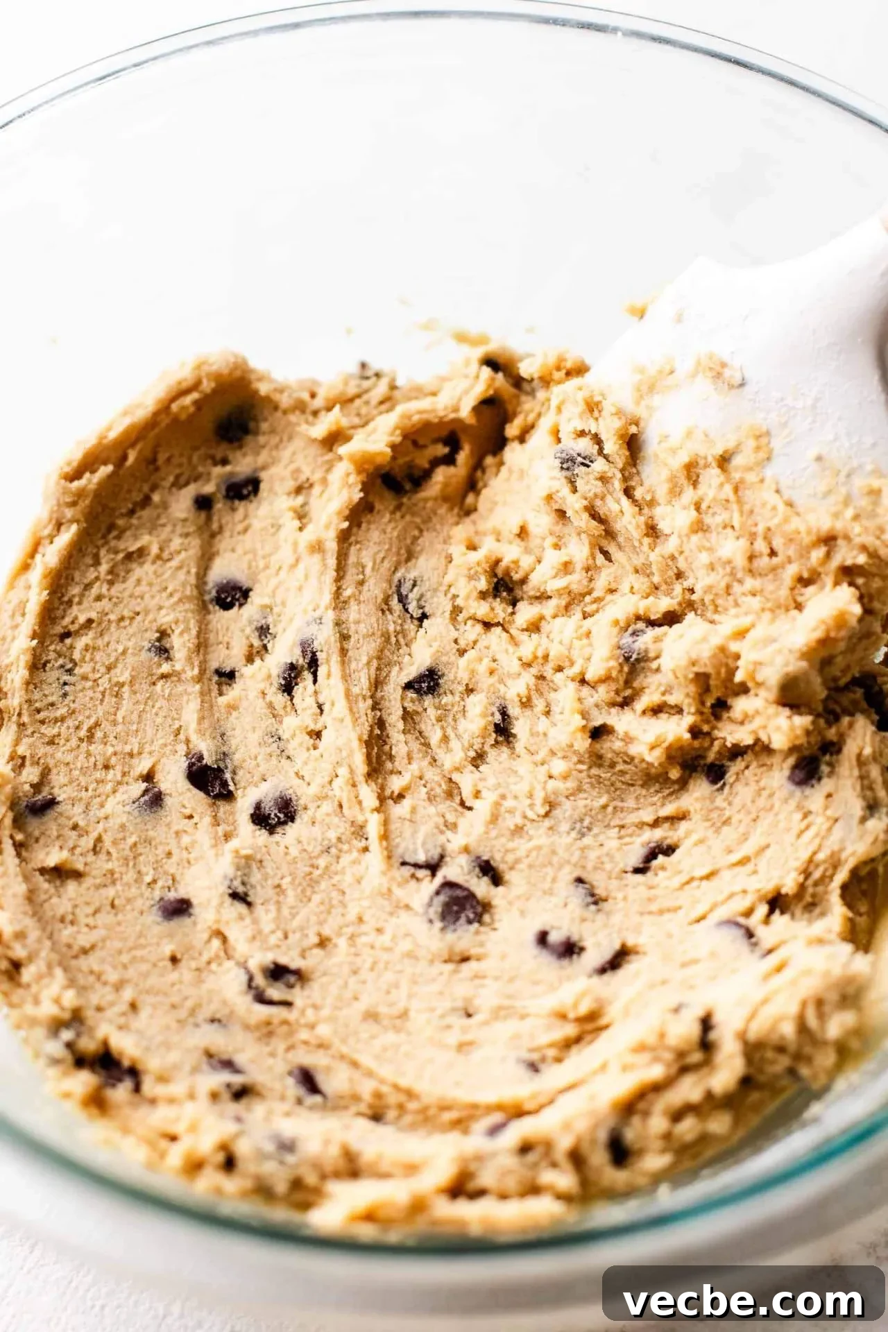 Giant Nutella-Stuffed Chocolate Chip Cookie Recipe 6 GIANT Nutella stuffed chocolate chip cookie dough in bowl