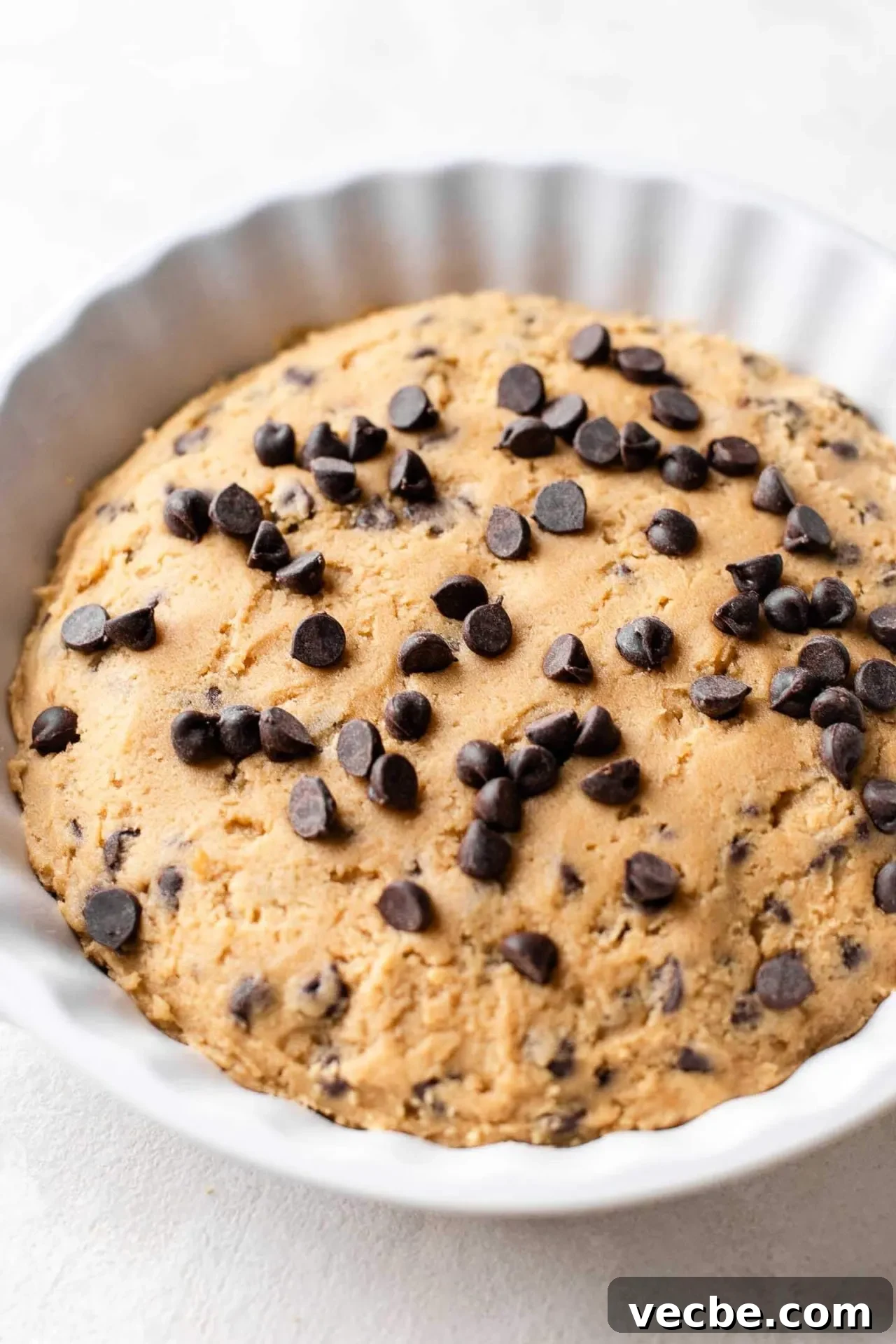 Giant Nutella-Stuffed Chocolate Chip Cookie Recipe 9 Nutella stuffed cookie dough in pie dish