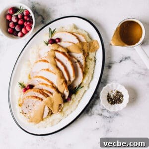 Make-Ahead Brown Gravy with Herbs and Peppercorns 3 homemade brown gravy in a serving dish
