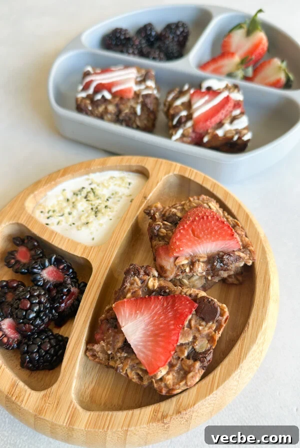 Chewy Chocolate Chip Granola Bars Recipe 11 Strawberry banana oat bars served with berries and yogurt.