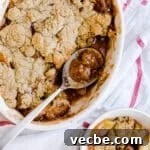 Gluten-Free Apple Recipes: 10+ Desserts, Snacks and More 12 Freshly baked apple crumble in white baking dish.