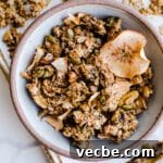 Gluten-Free Apple Recipes: 10+ Desserts, Snacks and More 14 Apple granola in a rustic bowl.