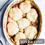 Gluten-Free Apple Recipes: 10+ Desserts, Snacks and More 10 A fruit cobbler in a white dish.