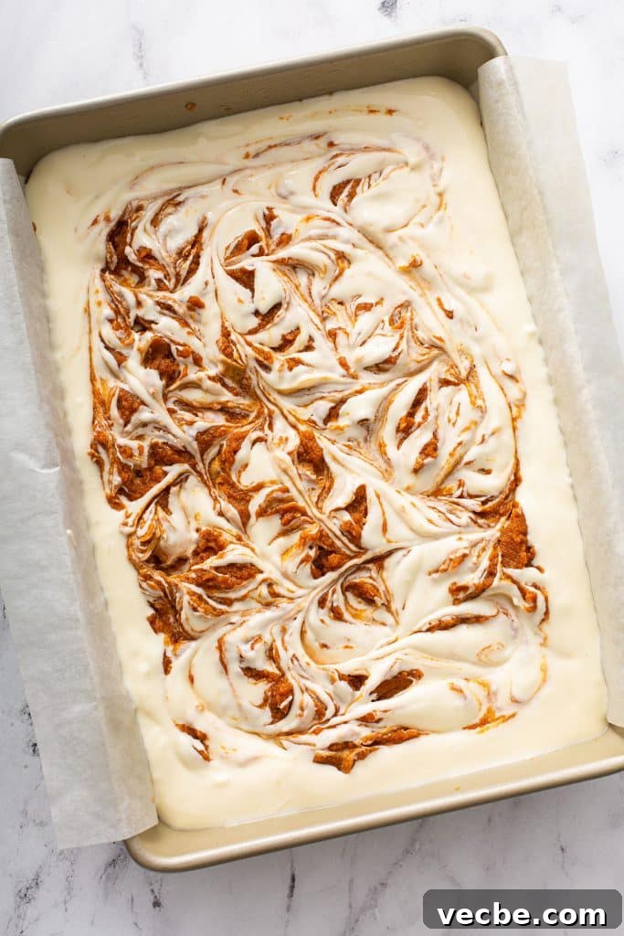 Pumpkin Cheesecake Bars with Creamy Swirl 11 Pumpkin butter swirled through cheesecake batter.
