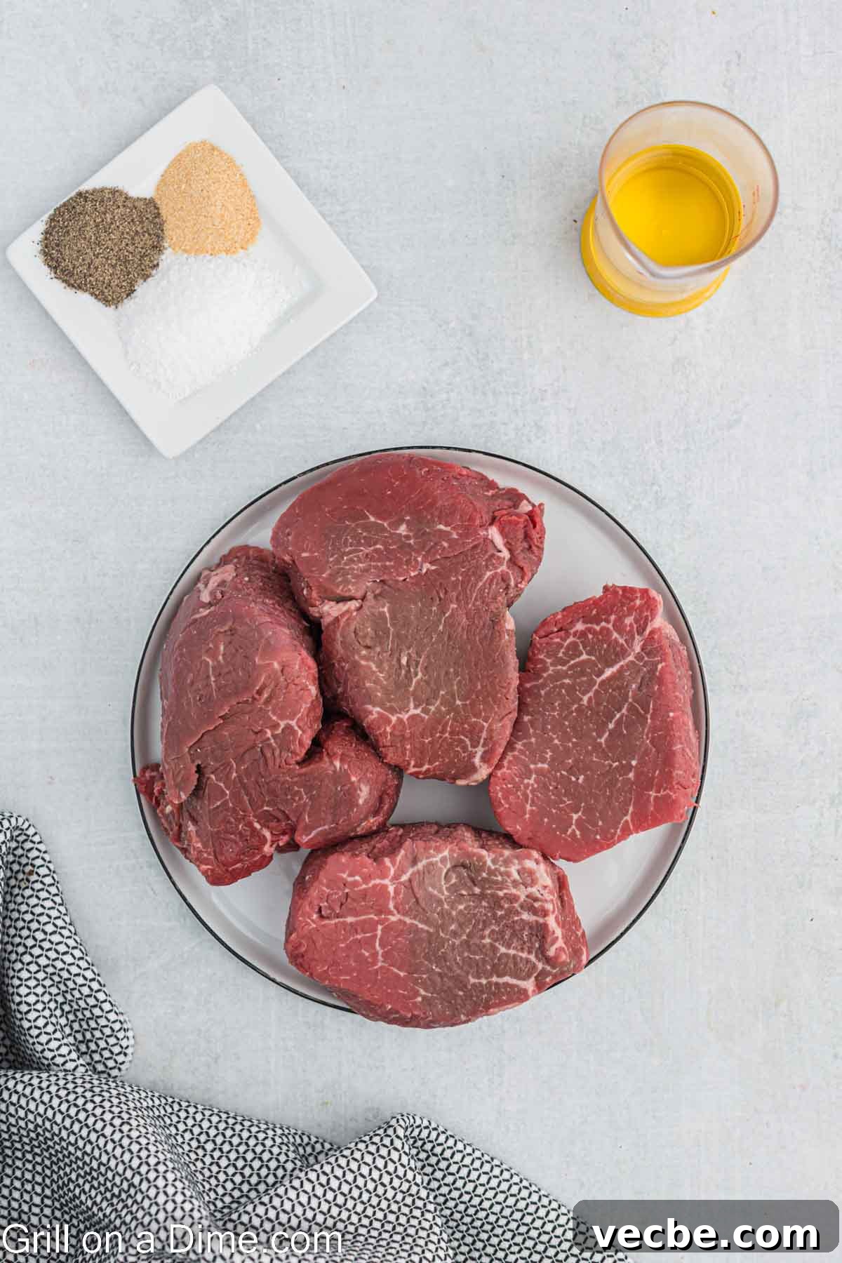 Grilled Filet Mignon Recipe: Tender, Juicy Steak 3 Ingredients needed - beef filets, salt, pepper, garlic powder, oil