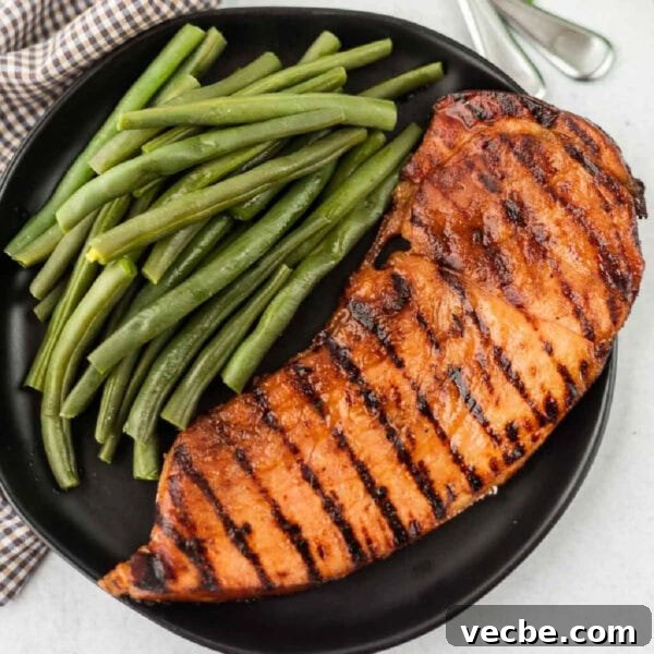 Grilled Filet Mignon Recipe: Tender, Juicy Steak 9 Grilled ham steak on a plate with fresh green beans