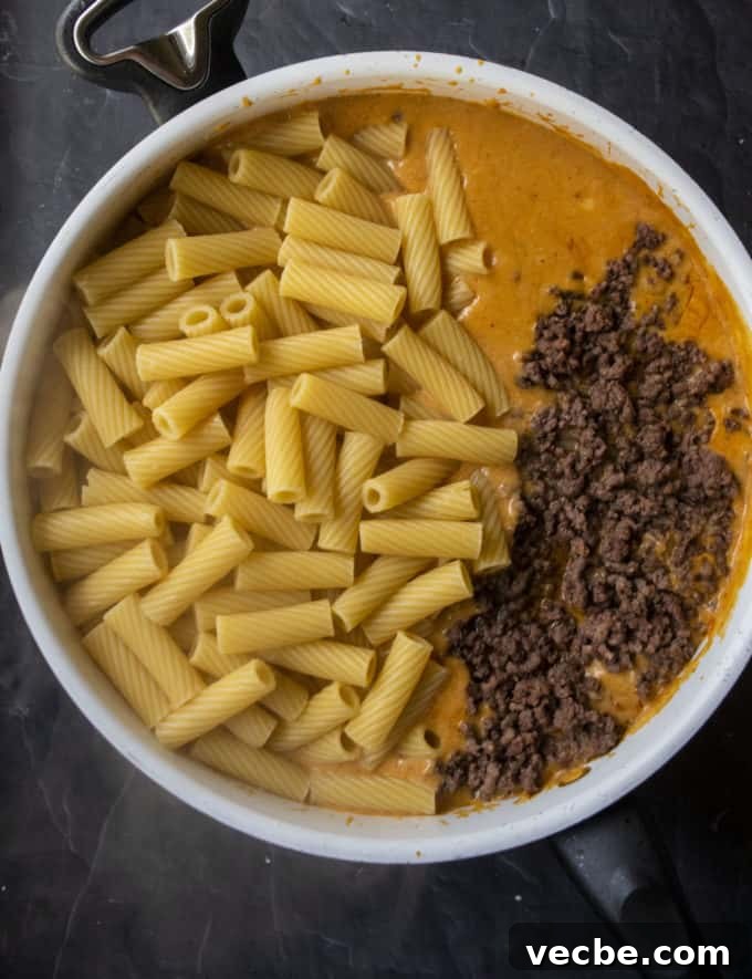 Cheesy Beef Taco Pasta Bake Recipe 8 meat pasta and sauce in a skillet