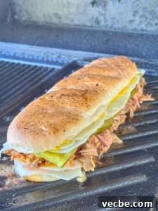 How to Make an Authentic Cuban Sandwich 3 cuban sandwich on press