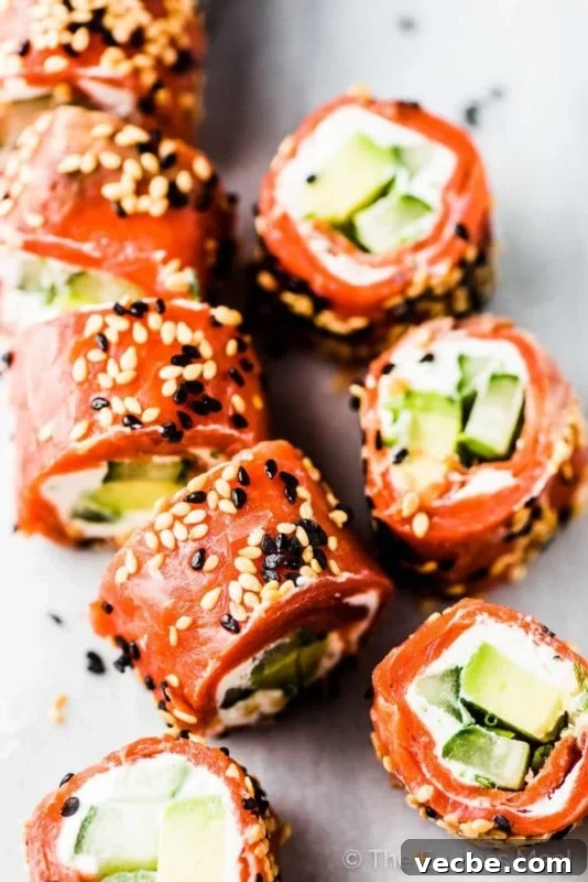 15 No-Bake Snack Recipes You Can Make in Minutes 13 No bake recipe of salmon wrapped in tzatziki, avocado, and coated in sesame seeds sliced.