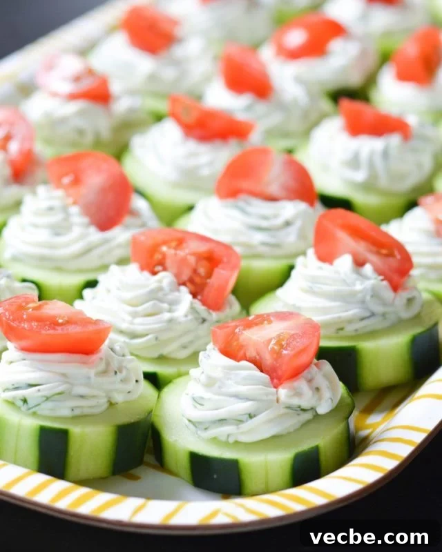 15 No-Bake Snack Recipes You Can Make in Minutes 10 Sliced cucumbers with piped cheese and yogurt topped with tomatoes.