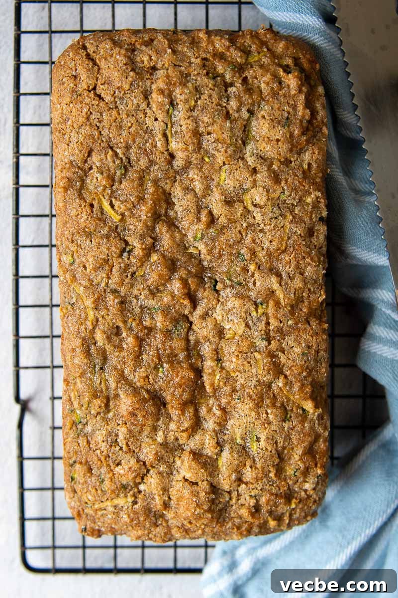 Gluten-Free Almond Flour Zucchini Bread: Secret Moist Recipe 3 overhead shot of zucchini bread cooling on a wire rack