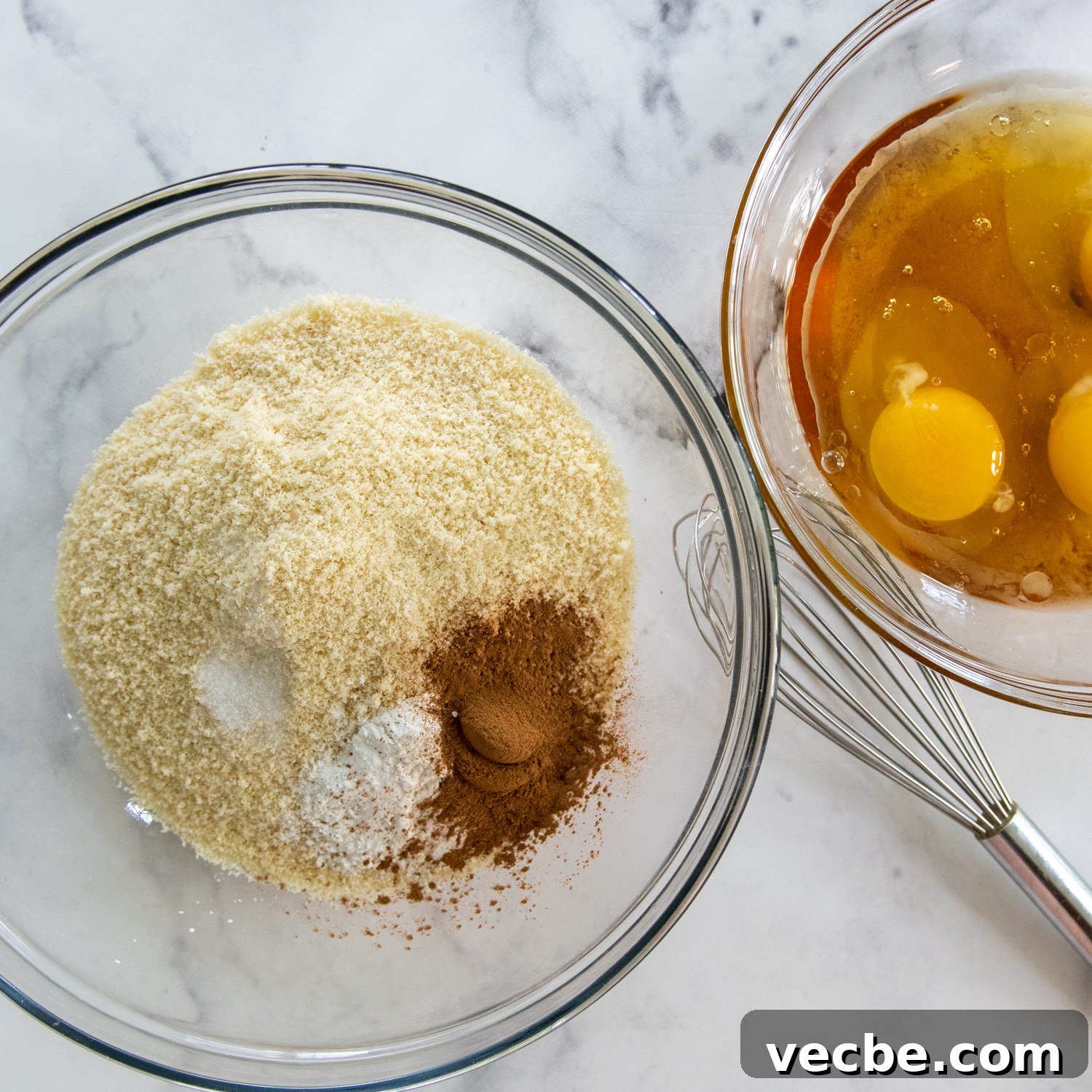 Gluten-Free Almond Flour Zucchini Bread: Secret Moist Recipe 5 the dry ingredients and wet ingredients in two separate glass bowls.