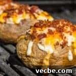 Twice-Baked Potatoes with Grilled Cheddar and Bacon 4 Grilled Cheddar Bacon Twice Baked Potatoes thumbnail