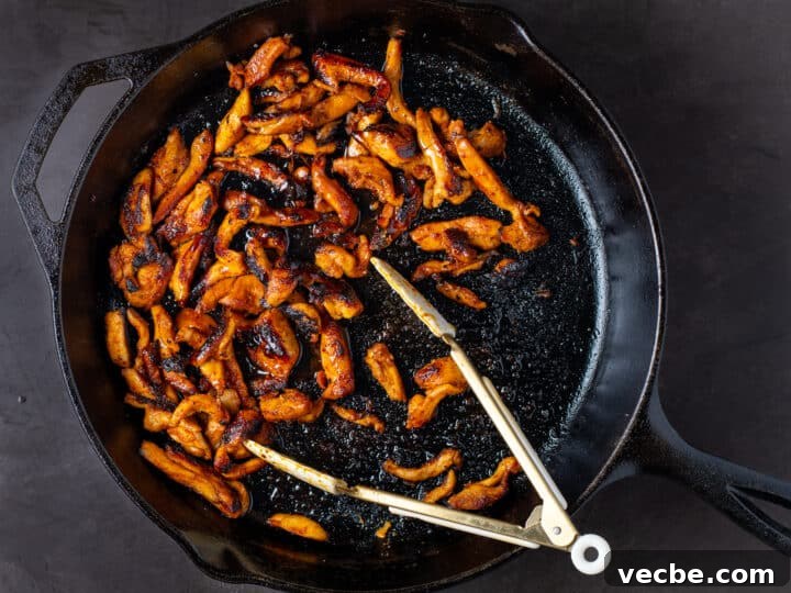 Caramelized Chipotle Chicken Fajitas Recipe 13 charred and carmelized chicken in a cast iron skillet