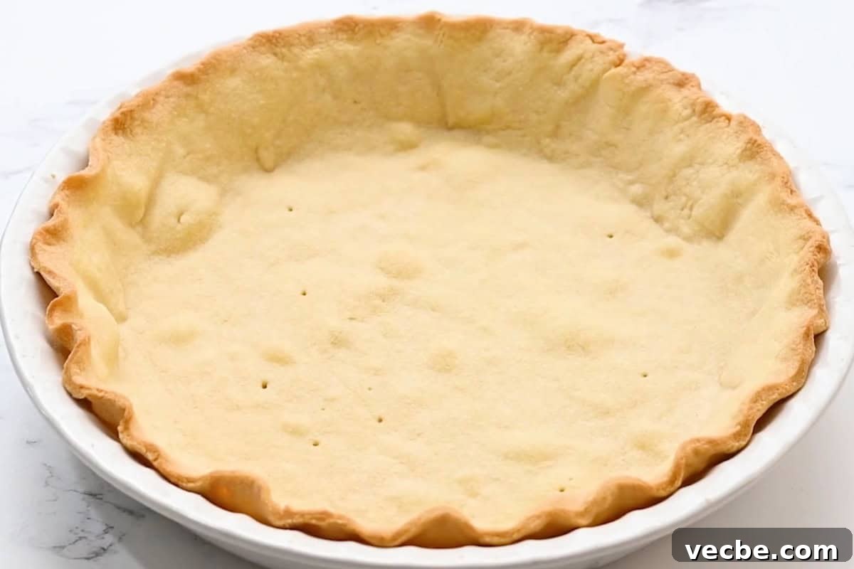 No Bake Strawberry Jello Pie Recipe 14 baked crimped pie crust in a pie dish.