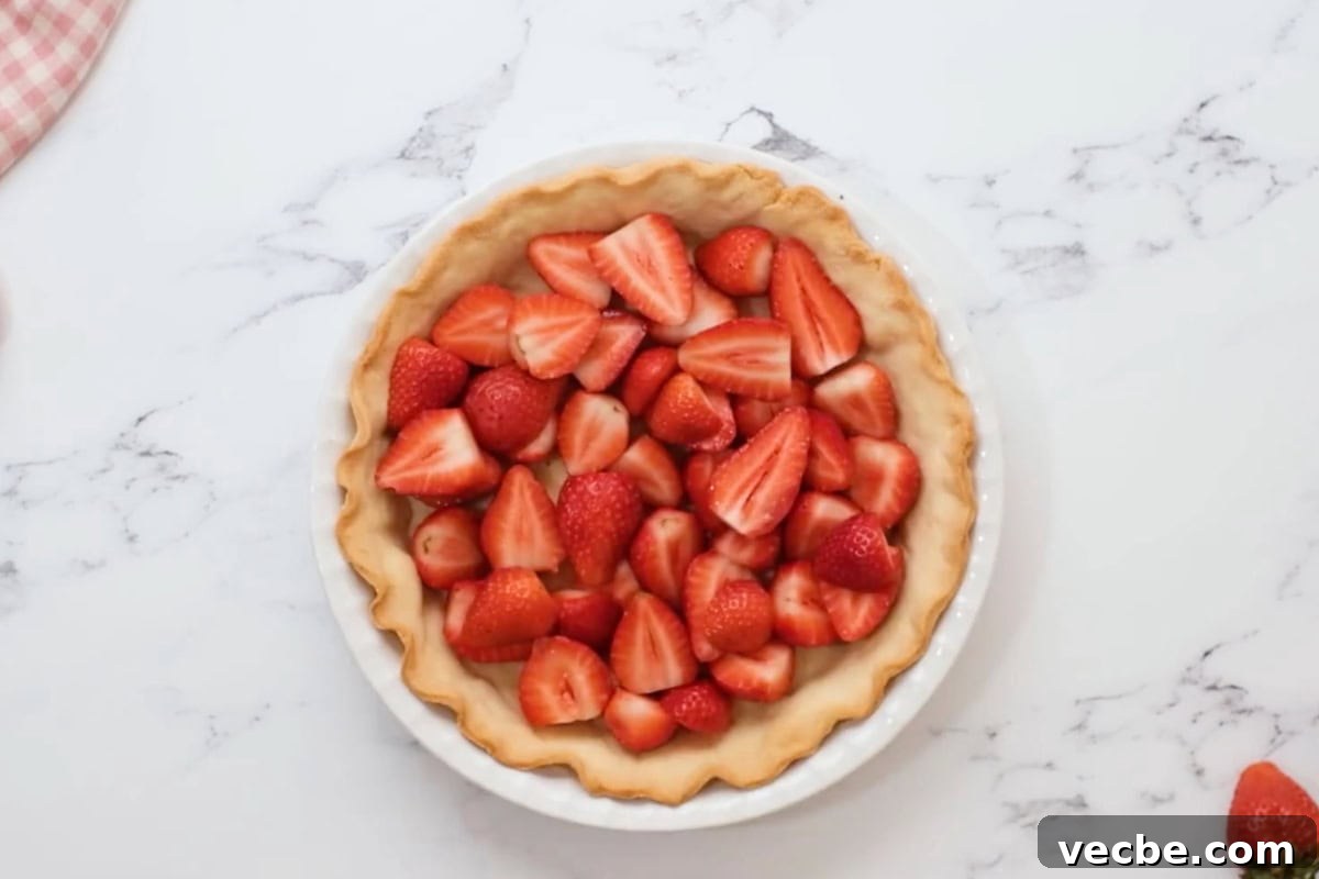 No Bake Strawberry Jello Pie Recipe 17 halved strawberries in a baked pie crust.
