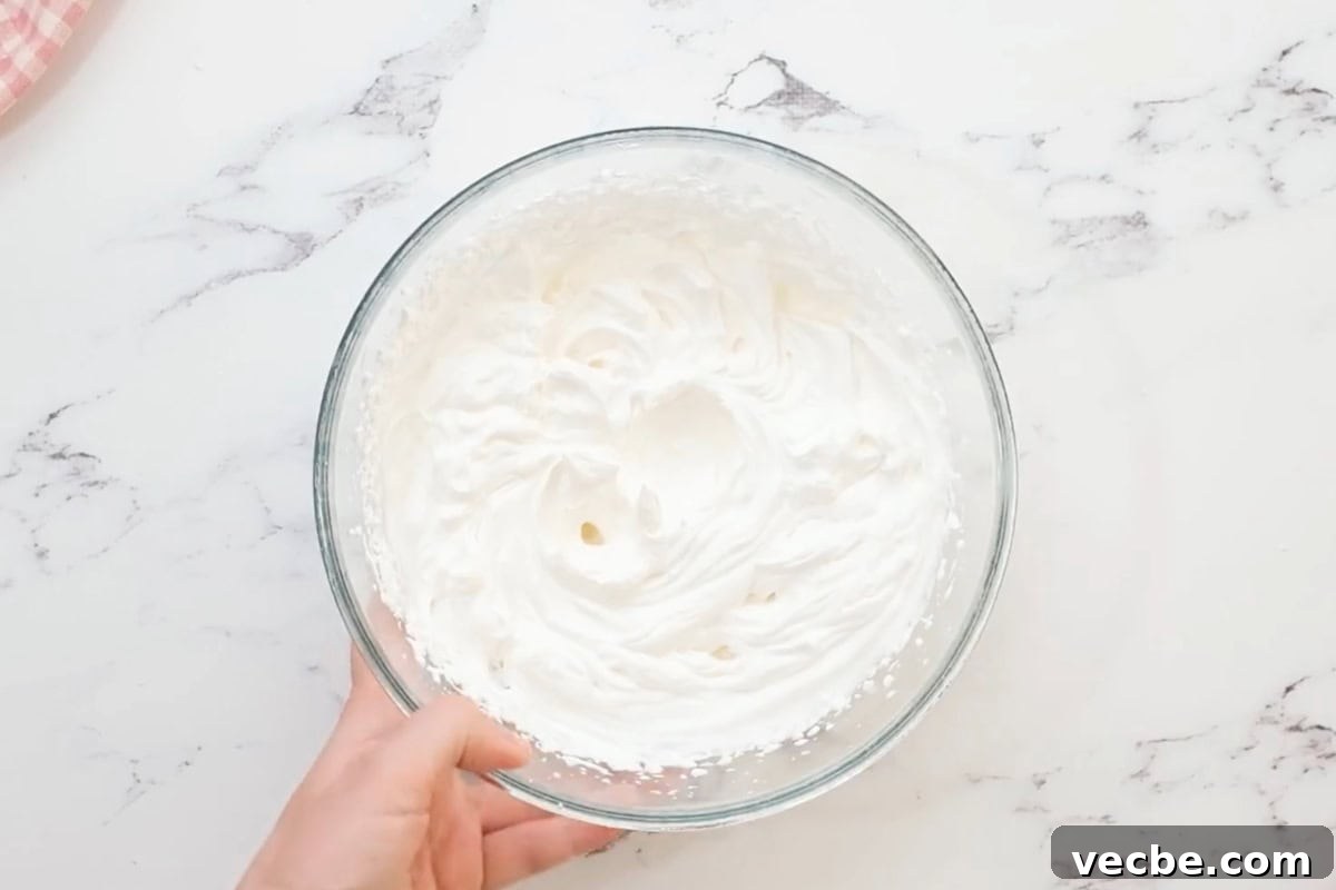 No Bake Strawberry Jello Pie Recipe 19 homemade whipped cream in a glass bowl.