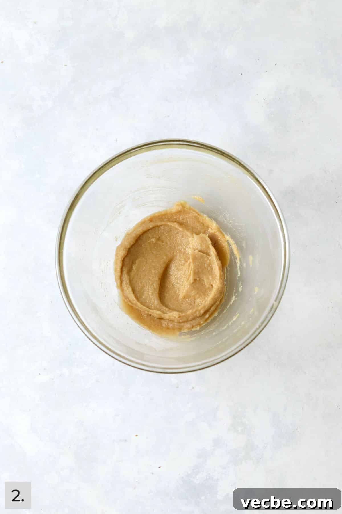 Single-Serve Cowboy Cookie Recipe for One - Small Batch 5 Butter, sugar, egg yolk, and vanilla creamed in a mixing bowl.