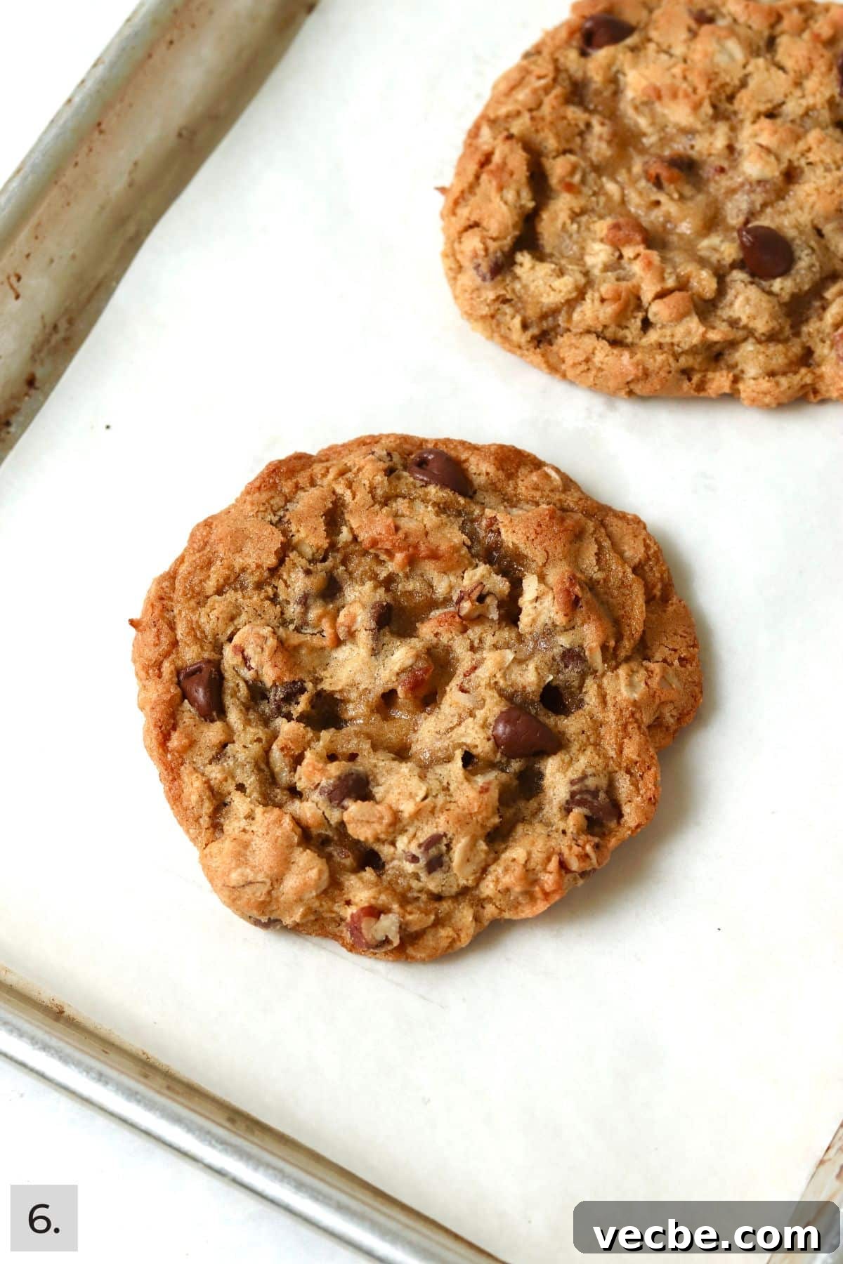 Single-Serve Cowboy Cookie Recipe for One - Small Batch 9 Baked single serve cowboy cookie on a baking sheet.
