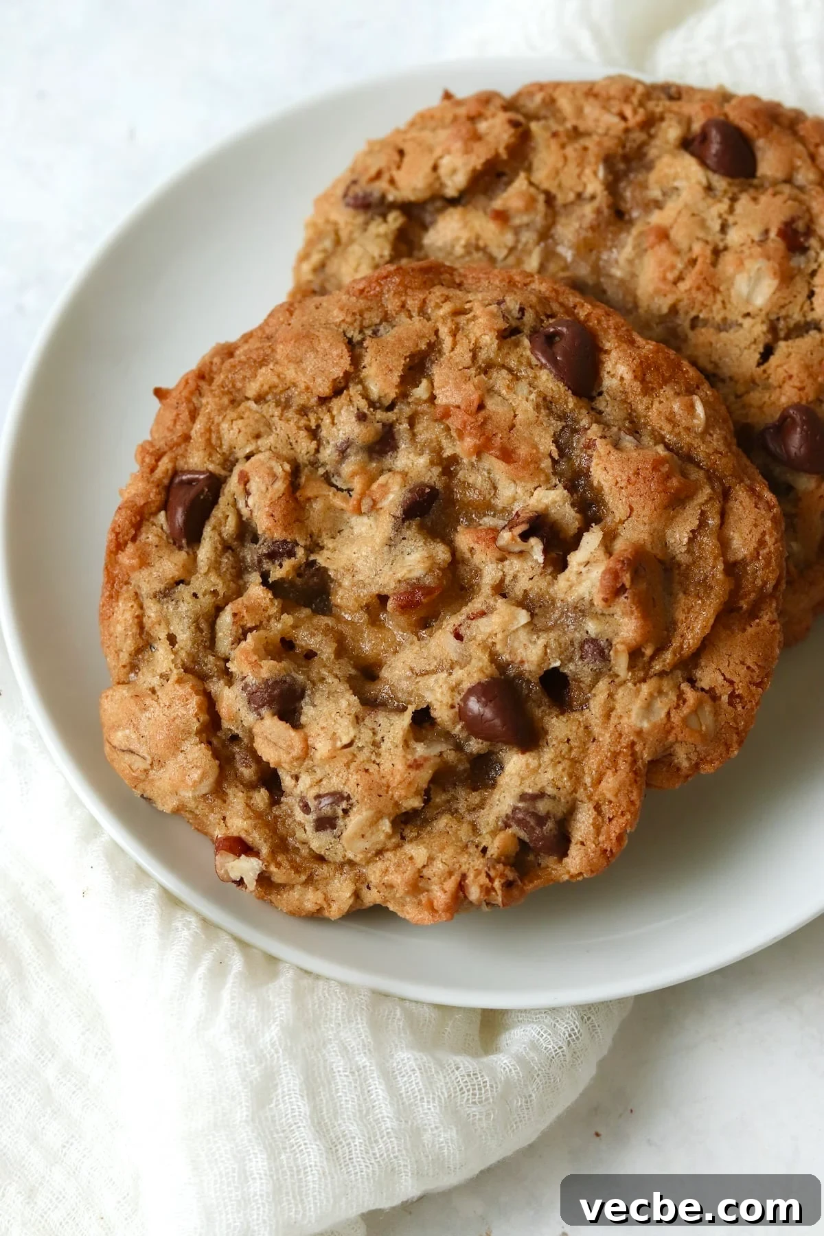 Single-Serve Cowboy Cookie Recipe for One - Small Batch 10 Two large cowboy cookies on a plate.