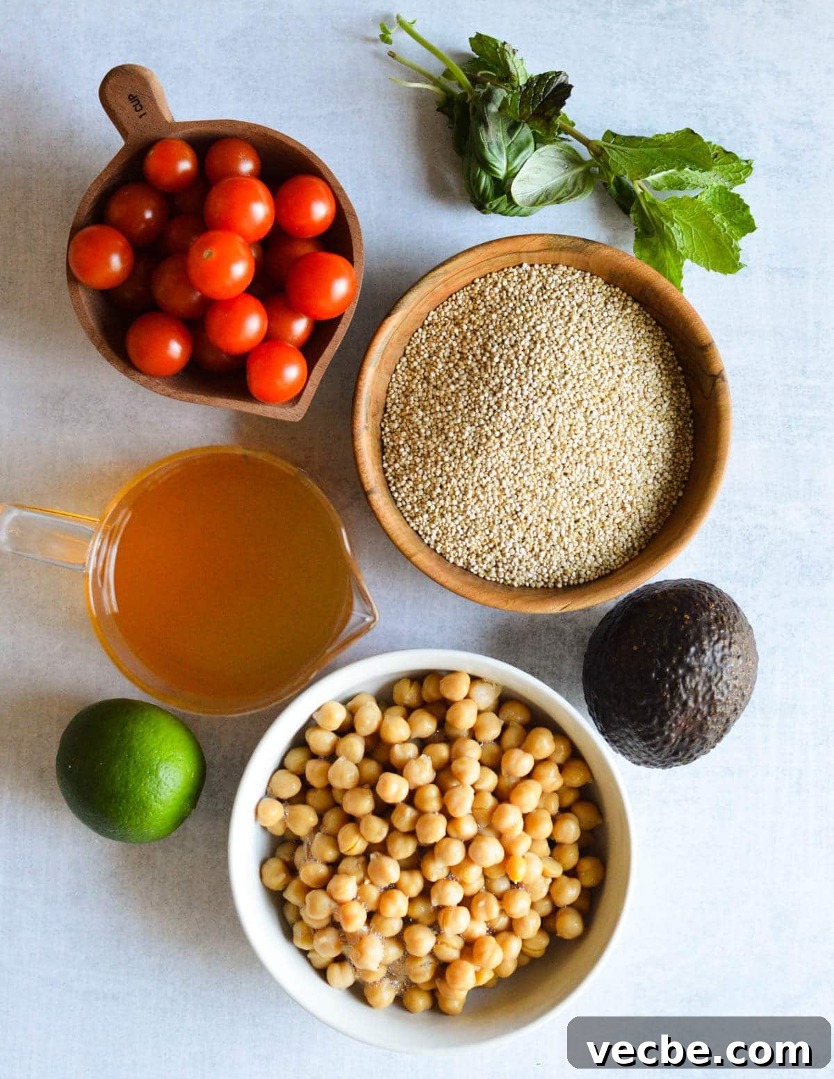 Herbed Quinoa Salad with Avocado and Chickpeas 3 tomatoes, quinoa, herbs, avocado, vegetable stock, lime, chickpeas.