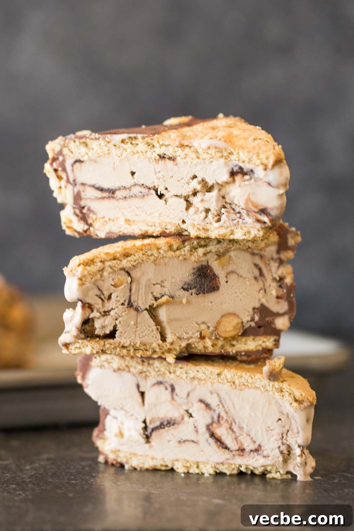 Homemade Graham Cracker Ice Cream Sandwiches Recipe 5 A stack of three Graham Cracker Ice Cream Sandwiches cut in half.