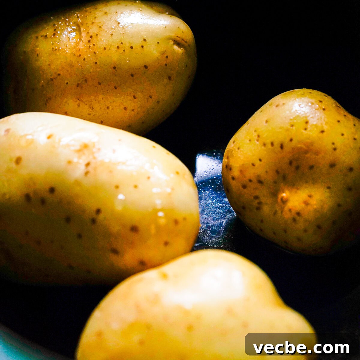 Classic Creamy Potato Salad with Hard Boiled Eggs Recipe 3 Bowls of potatoes for potato salad prep