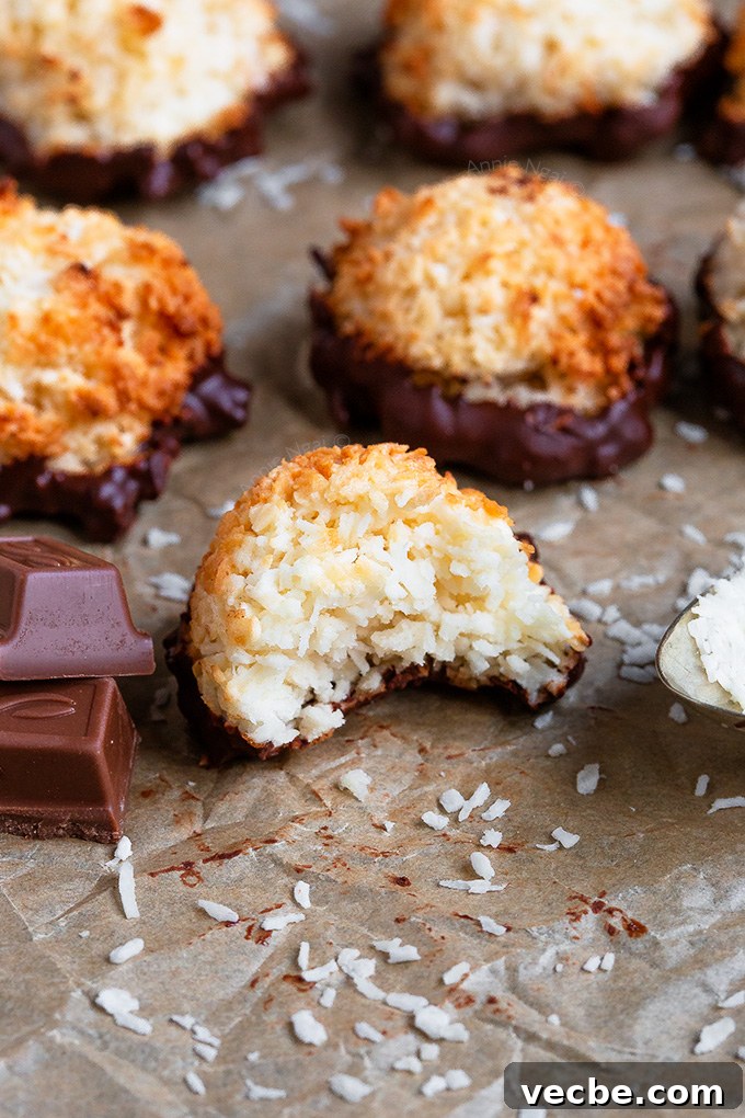 Quick Coconut Macaroons Recipe Ready in 20 Minutes 5 Coconut macaroons with chocolate bases, arranged on a cooling rack