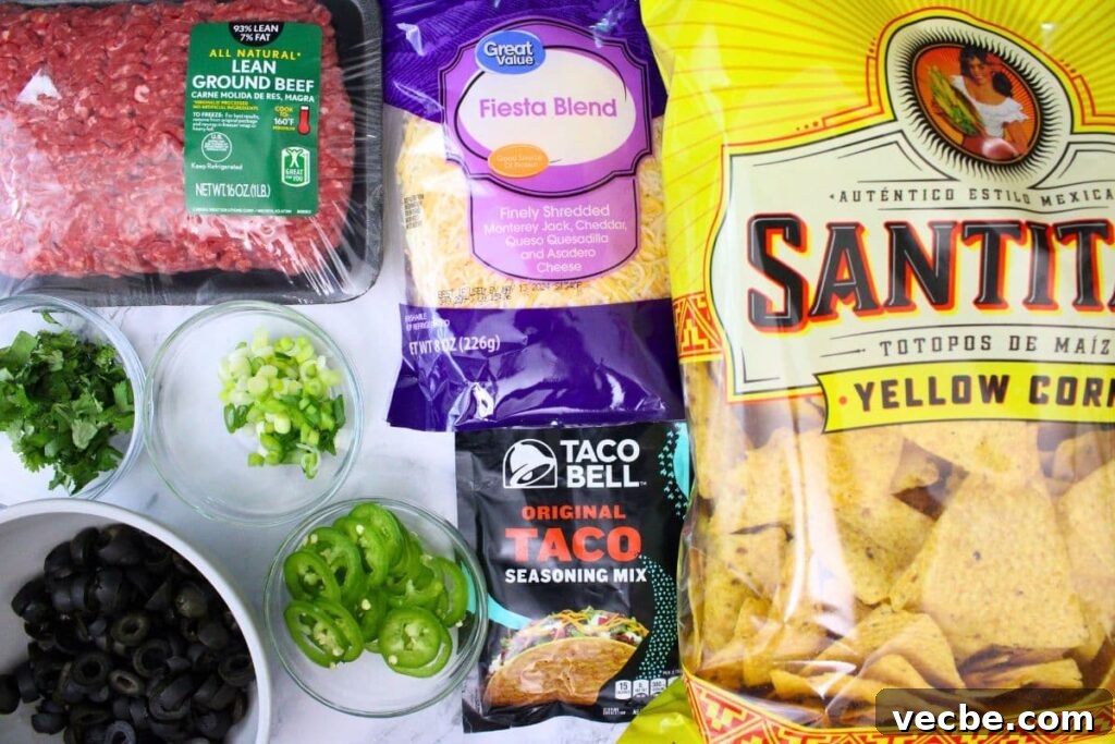 Crispy Air Fryer Ground Beef Nachos for Game Day 4 ingredients to make air fryer nachos with ground beef