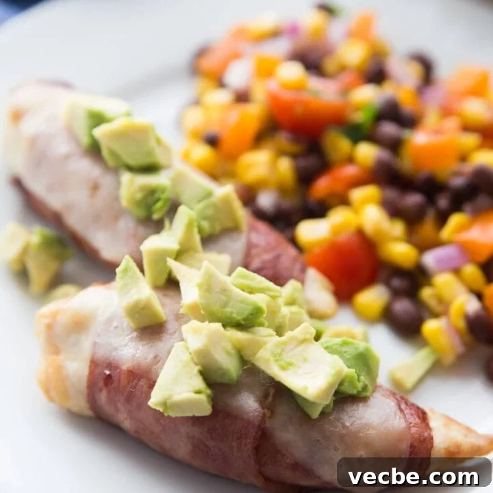 Bacon Wrapped Chicken Tenders served with sauteed zucchini