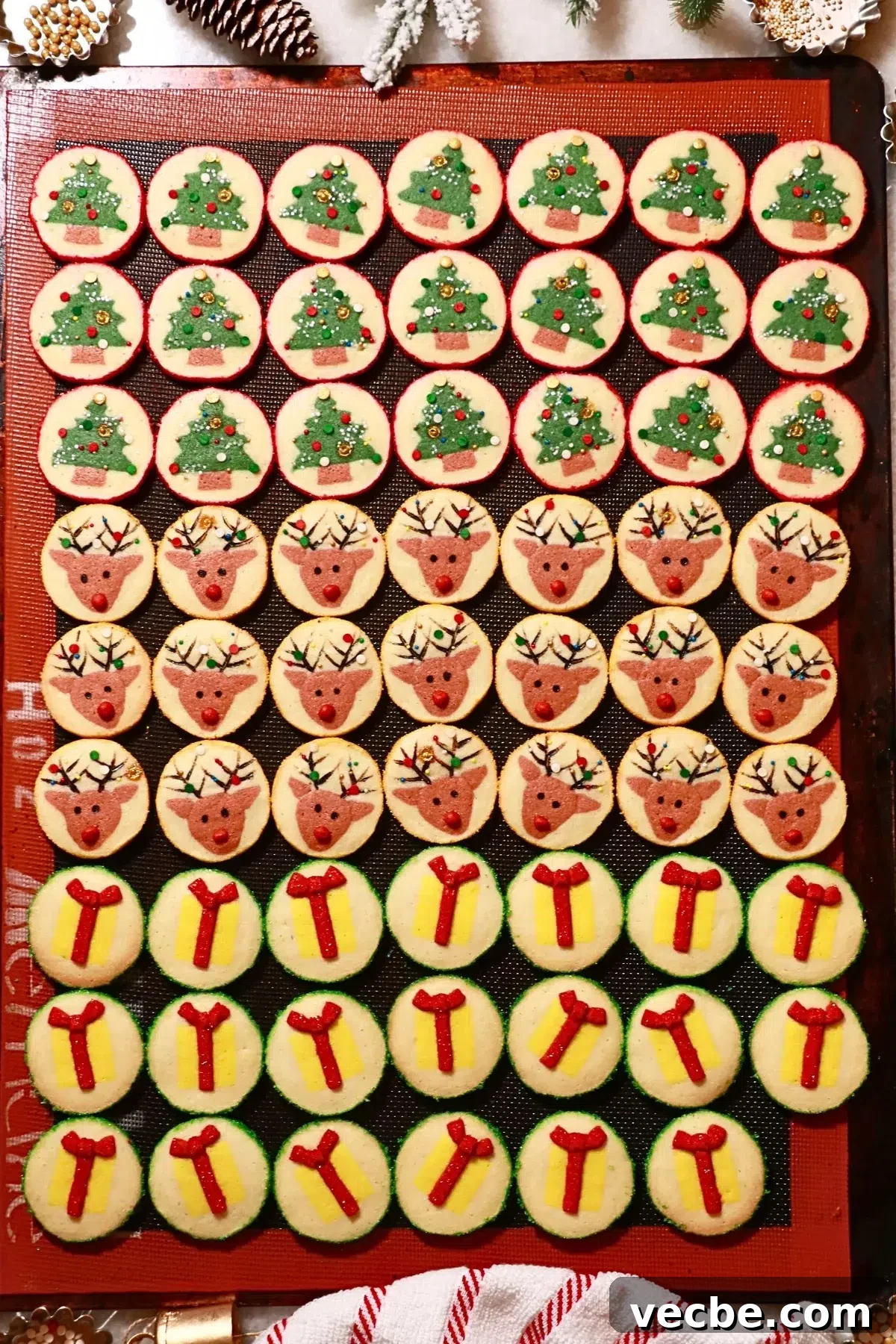 7 Pro Tips for Baking Bakery-Style Cookies Every Time 8 homemade slice-and-bake Christmas cookies on a baking sheet