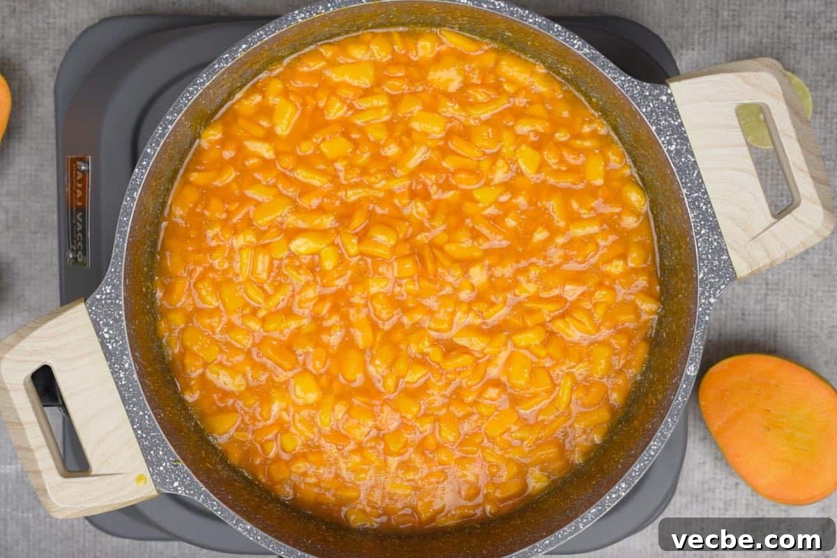 Mango Coulis Recipe: Silky Sweet Sauce for Desserts 6 Cooked mango coulis.