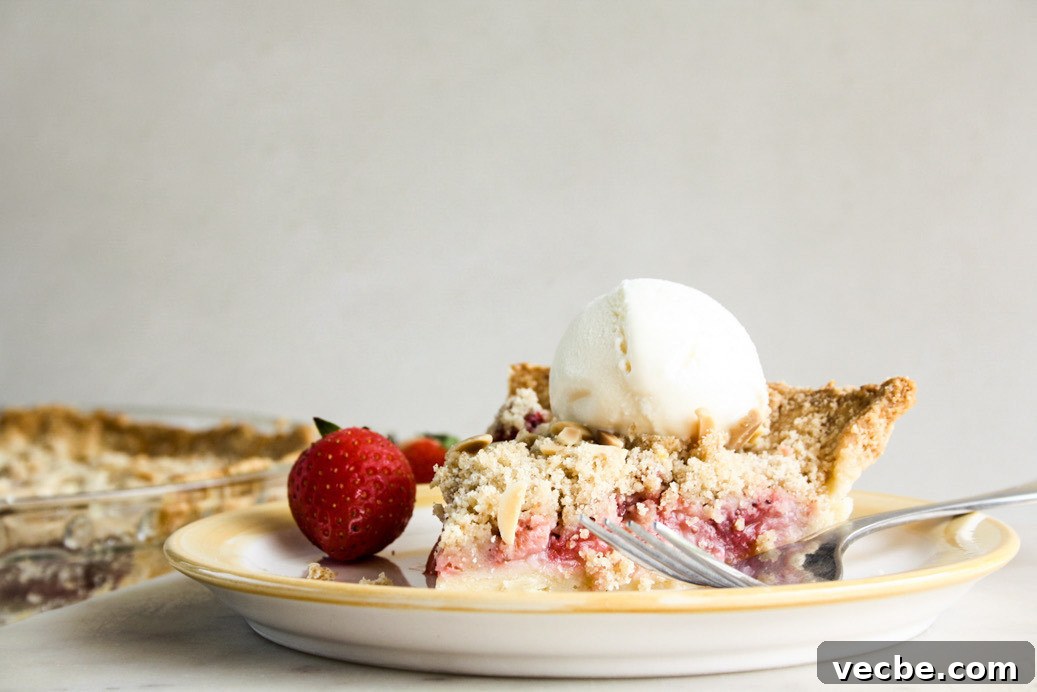 Strawberry Crumble Pie with Buttery Streusel 4 Juicy strawberries on homemade pie crust with a crunchy crumble topping