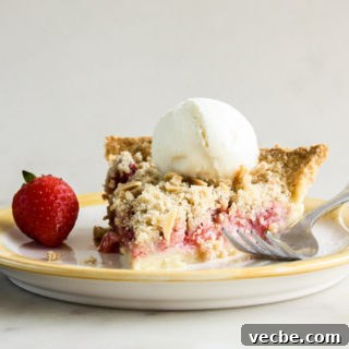Juicy strawberries on homemade pie crust with a crunchy crumble topping