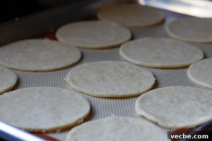 AppleCheddarHandpiesCutRounds Cut dough rounds for hand pies.