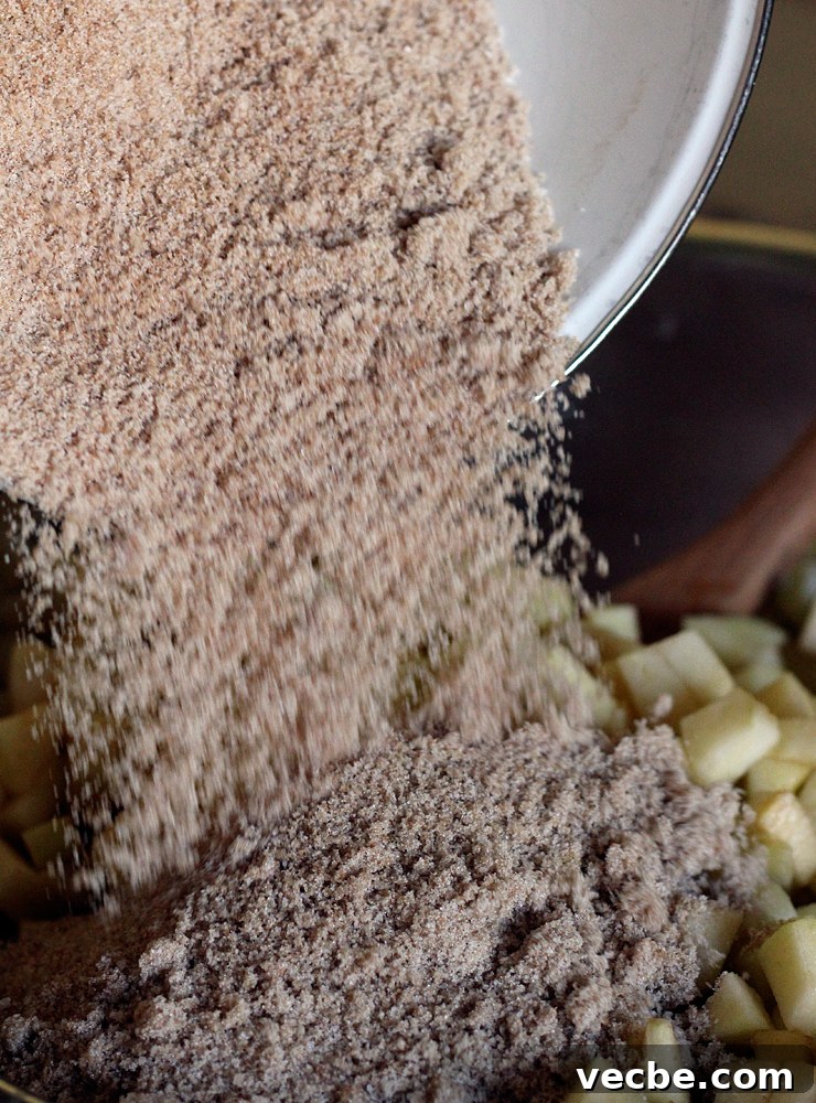 AppleCheddarHandpiesBrownSugar Brown sugar added to chopped apples.