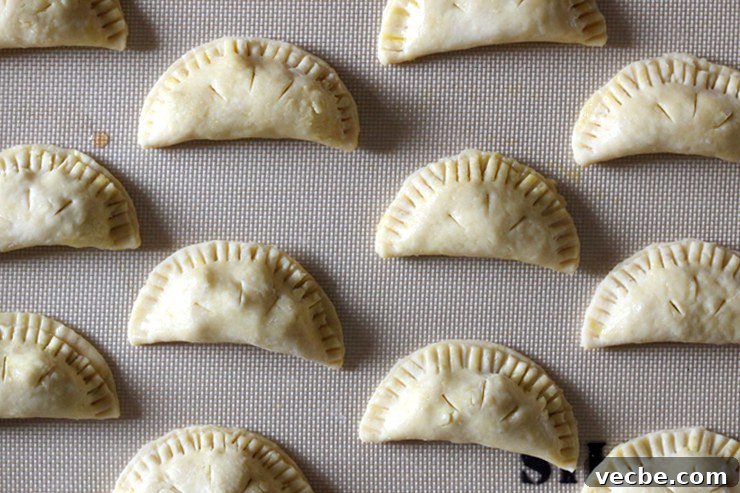 AppleCheddarHandpiesChilled Crimped apple cheddar hand pies.