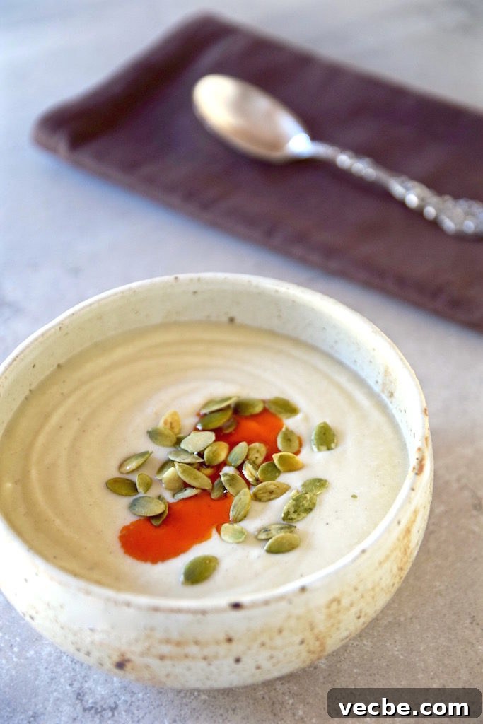 20+ Allergy-Friendly Winter Soups to Warm You This Season 14 roastedgarliccauliflowersoup-tastingpage