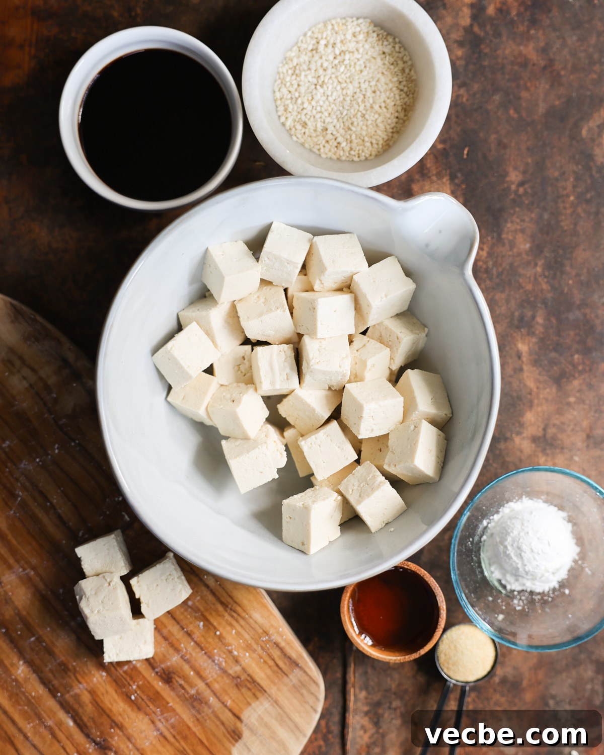 31 Tofu Recipes for Dinner, Stir Fries, Soups and More 3 An overhead shot of a bowl of the ingredients for the roasted tofu.