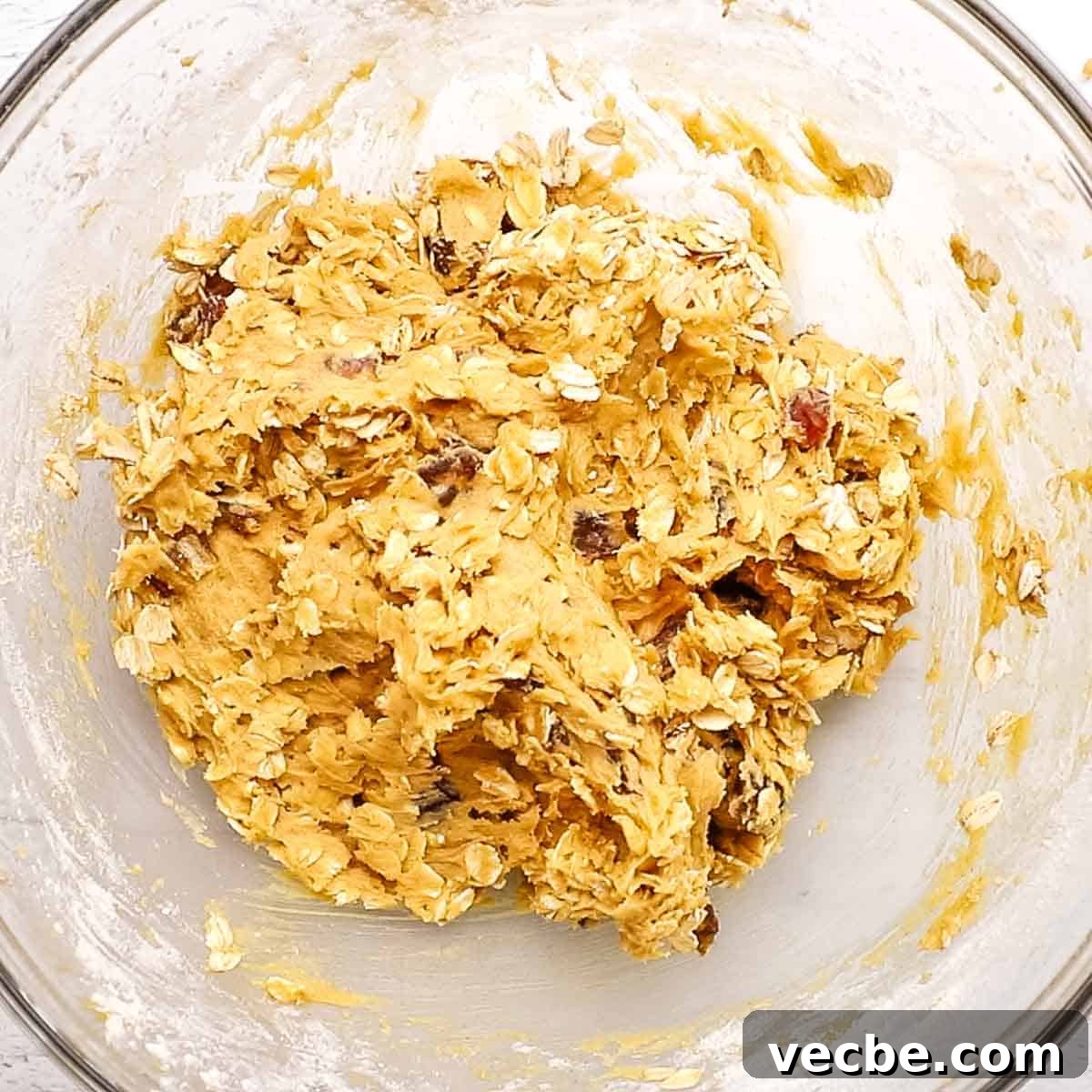 Chewy Date Oatmeal Cookies with Cinnamon 7 date oatmeal cookie dough in a bowl