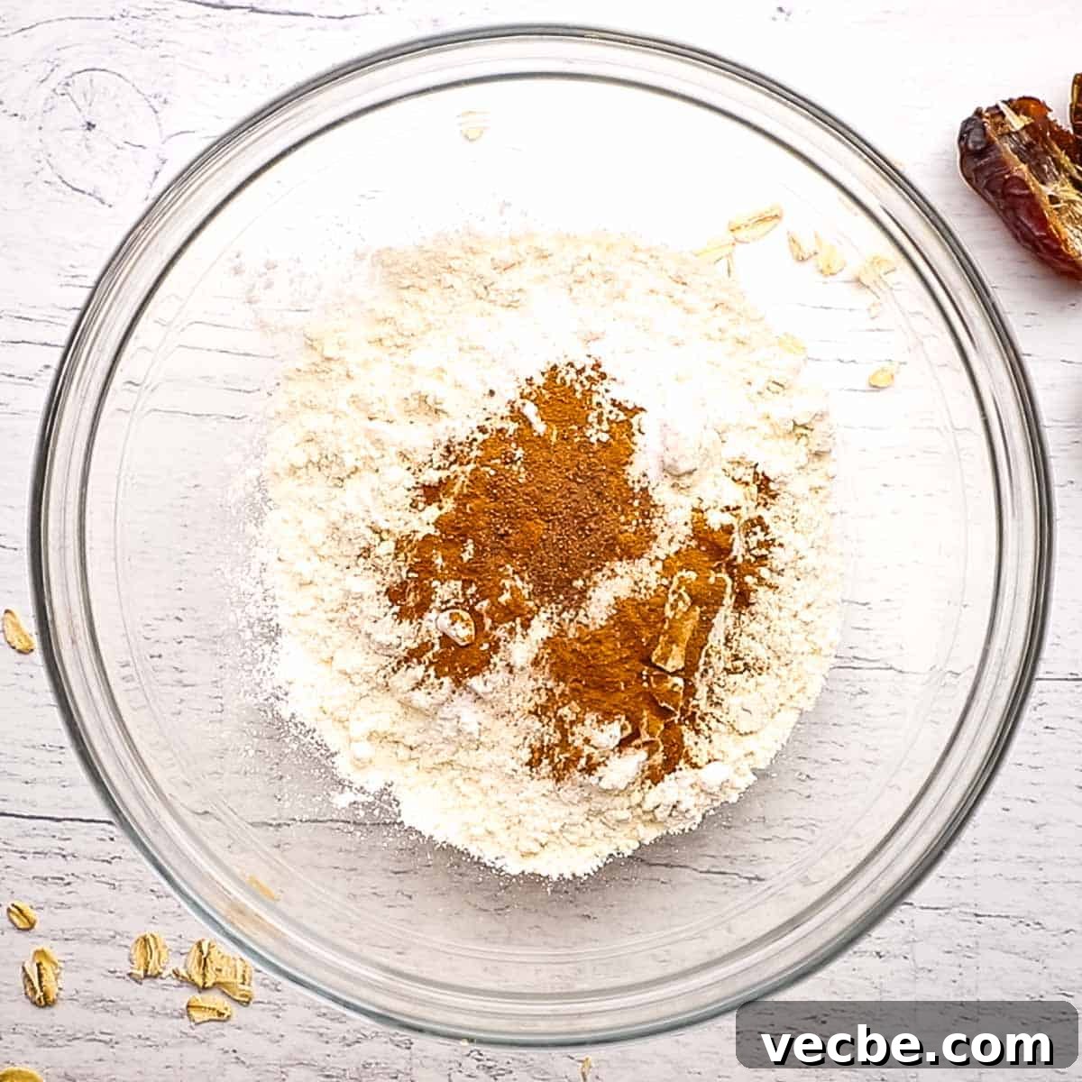 Chewy Date Oatmeal Cookies with Cinnamon 6 dry ingredients in a bowl
