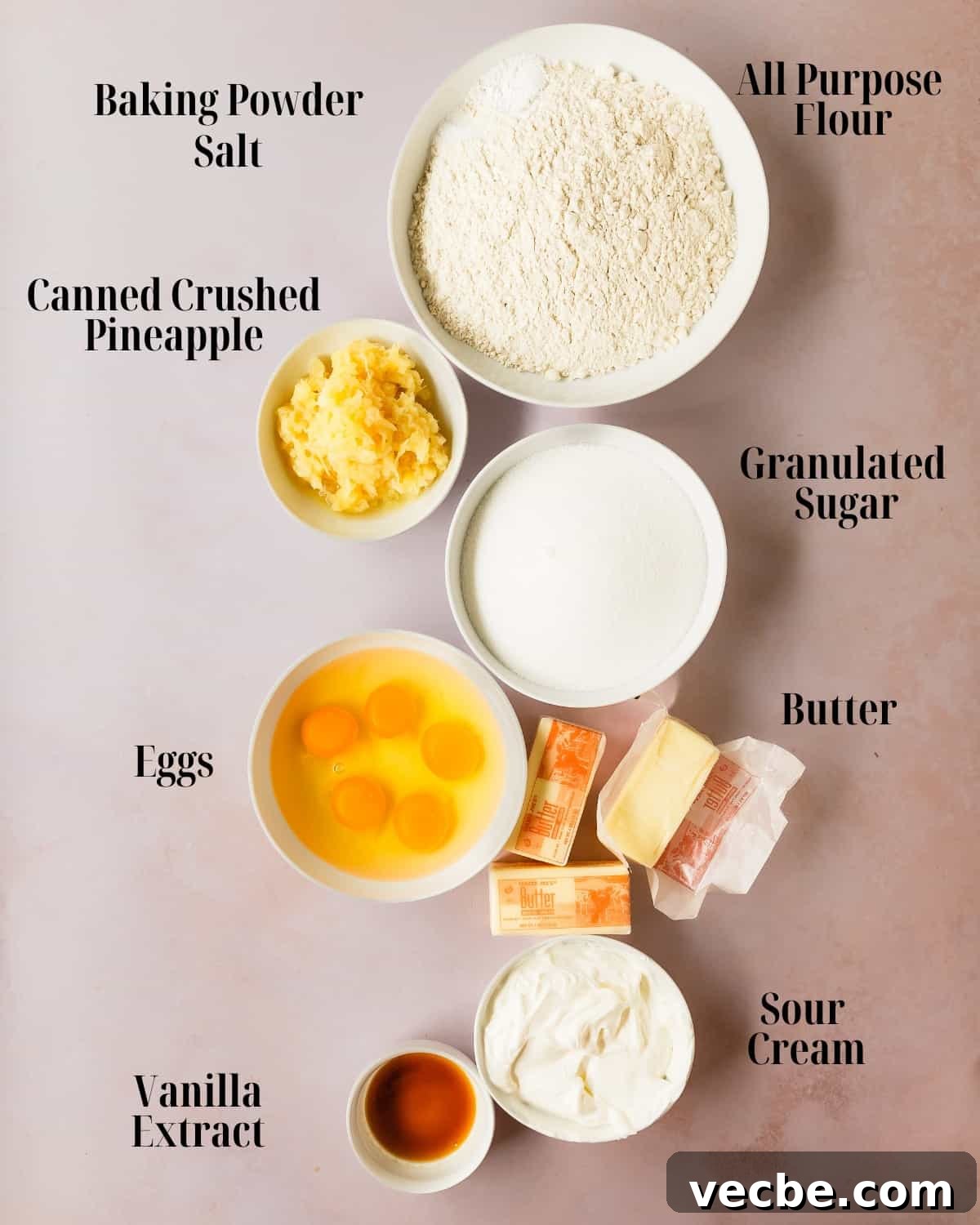 Moist Pineapple Pound Cake with Sweet Tropical Flavor 3 Ingredients for pineapple pound cake including flour, baking powder, salt, sugar, butter, eggs, vanilla, sour cream, and crushed pineapple.