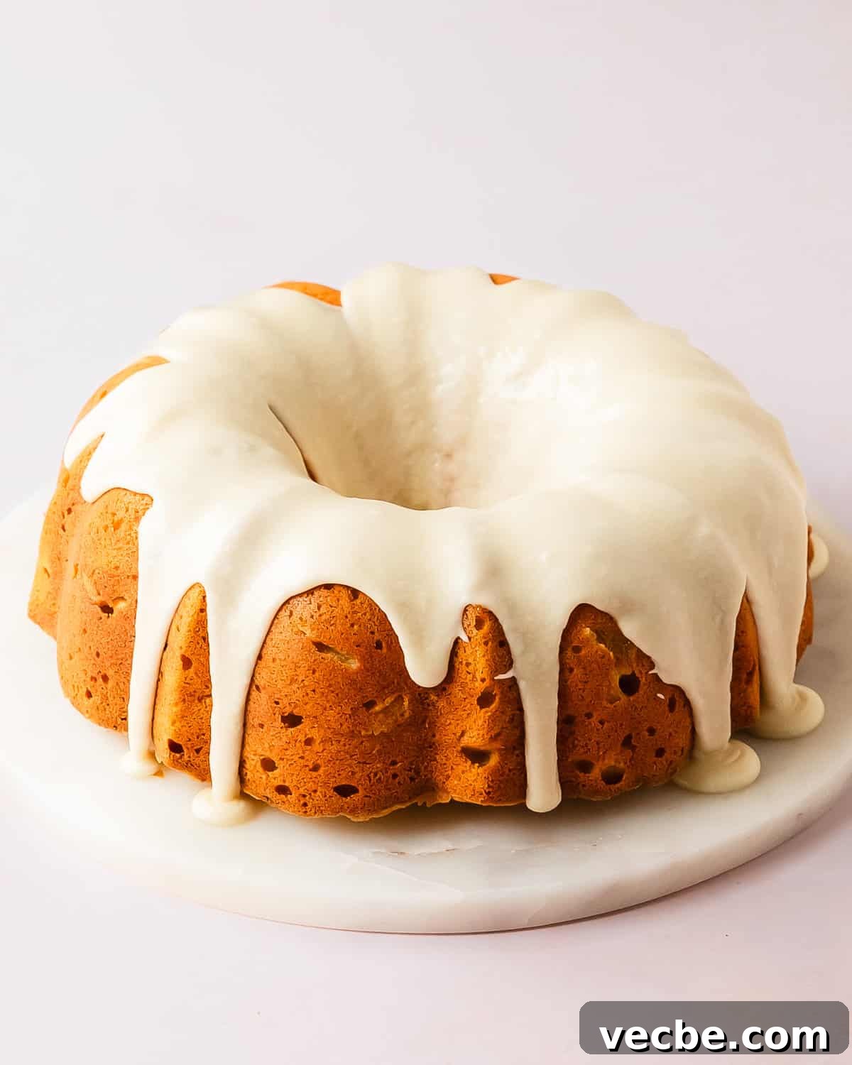 Moist Pineapple Pound Cake with Sweet Tropical Flavor 5 Glazed pineapple pound cake baked in a bundt pan.