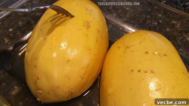 How To Cook Spaghetti Squash Cooked spaghetti squash tested with a fork for tenderness