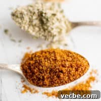 Baked Potato Seasoning for Crispy Oven Potatoes 5 Spice blends on spoons.